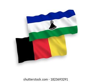 National vector fabric wave flags of Lesotho and Belgium isolated on white background. 1 to 2 proportion.