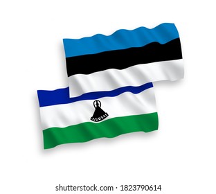 Banderas de ondulación de tejido vectorial nacional de Estonia y Lesotho aisladas en fondo blanco. de 1 a 2.