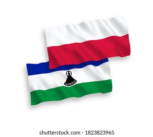 National vector fabric wave flags of Lesotho and Poland isolated on white background. 1 to 2 proportion.