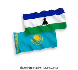 National vector fabric wave flags of Kazakhstan and Lesotho isolated on white background. 1 to 2 proportion.