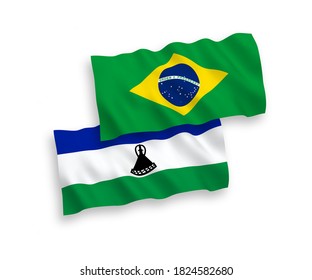 National vector fabric wave flags of Brazil and Lesotho isolated on white background. 1 to 2 proportion.