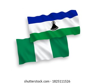 Nationale Vektor-Wellen-Flaggen von Lesotho und Nigeria einzeln auf weißem Hintergrund. 1 bis 2 %.