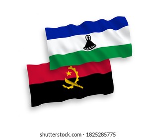 National vector fabric wave flags of Lesotho and Angola isolated on white background. 1 to 2 proportion.