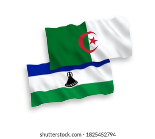 National vector fabric wave flags of Lesotho and Algeria isolated on white background. 1 to 2 proportion.