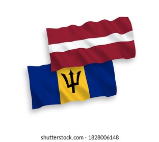 National vector fabric wave flags of Latvia and Barbados isolated on white background. 1 to 2 proportion.