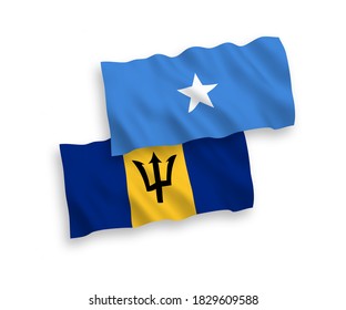 National vector fabric wave flags of Barbados and Somalia isolated on white background. 1 to 2 proportion.