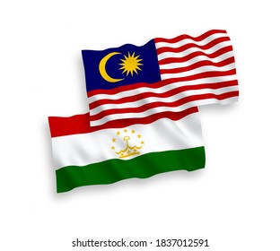 National vector fabric wave flags of Tajikistan and Malaysia isolated on white background. 1 to 2 proportion.