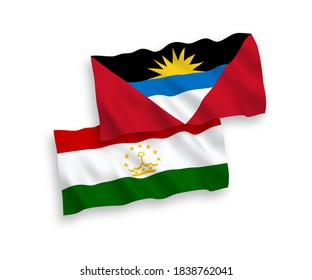 National vector fabric wave flags of Tajikistan and Antigua and Barbuda isolated on white background. 1 to 2 proportion.