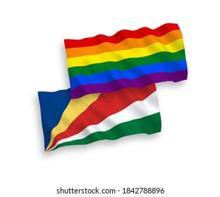 Banderas nacionales de tela vectorial ondean banderas del orgullo gay arcoiris y Seychelles aisladas en fondo blanco. de 1 a 2.
