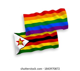 National vector fabric wave flags of Rainbow gay pride and Zimbabwe isolated on white background. 1 to 2 proportion.