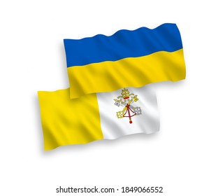 National vector fabric wave flags of Vatican and Ukraine isolated on white background. 1 to 2 proportion.