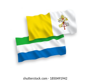 National vector fabric wave flags of Vatican and Sierra Leone isolated on white background. 1 to 2 proportion.