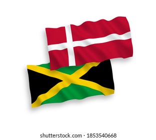 National vector fabric wave flags of Denmark and Jamaica isolated on white background. 1 to 2 proportion.