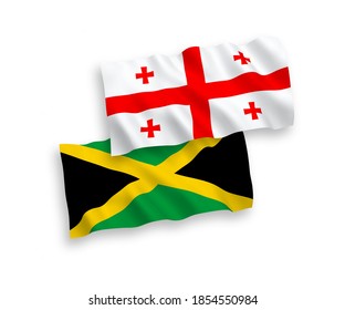 Banderas de ondulación de tela vectorial nacional de Jamaica y Georgia aisladas en fondo blanco. de 1 a 2.