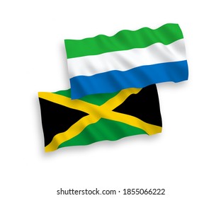 Nationale Vektor-Wellen-Flaggen von Jamaika und Sierra Leone einzeln auf weißem Hintergrund. 1 bis 2 %.