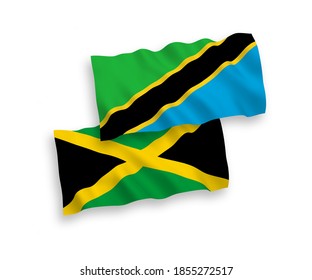 National vector fabric wave flags of Jamaica and Tanzania isolated on white background. 1 to 2 proportion.