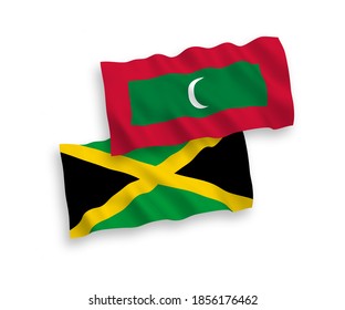 National vector fabric wave flags of Jamaica and Maldives isolated on white background. 1 to 2 proportion.