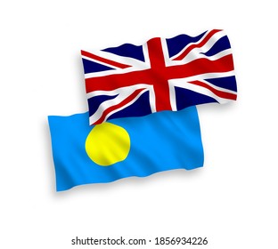 National vector fabric wave flags of Great Britain and Palau isolated on white background. 1 to 2 proportion.