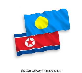 National vector fabric wave flags of North Korea and Palau isolated on white background. 1 to 2 proportion.