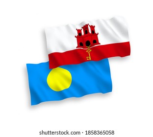 National vector fabric wave flags of Palau and Gibraltar isolated on white background. 1 to 2 proportion.
