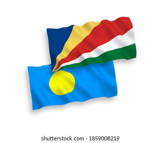 National vector fabric wave flags of Palau and Seychelles isolated on white background. 1 to 2 proportion.