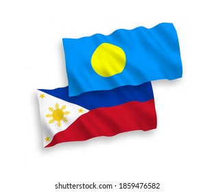 National vector fabric wave flags of Palau and Philippines isolated on white background. 1 to 2 proportion.