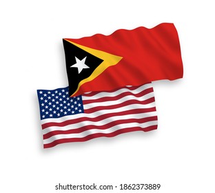 National vector fabric wave flags of East Timor and USA isolated on white background. 1 to 2 proportion.