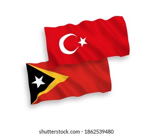 Banderas de olas de tela vectorial nacional de Turquía y Timor Oriental aisladas en fondo blanco. de 1 a 2.