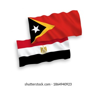 Nationale Vektor-Wellen-Flaggen von Osttimor und Ägypten einzeln auf weißem Hintergrund. 1 bis 2 %.