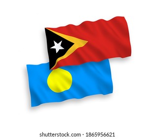 Banderas de olas de tela vectorial nacional de Timor Oriental y Palau aisladas en fondo blanco. de 1 a 2.