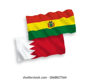 National vector fabric wave flags of Bolivia and Bahrain isolated on white background. 1 to 2 proportion.