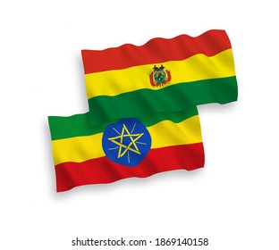 National vector fabric wave flags of Bolivia and Ethiopia isolated on white background. 1 to 2 proportion.