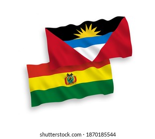 National vector fabric wave flags of Bolivia and Antigua and Barbuda isolated on white background. 1 to 2 proportion.