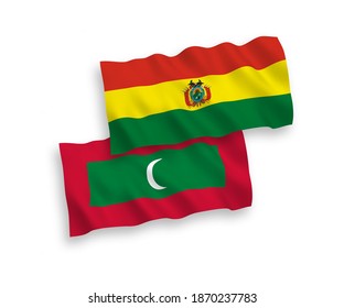 National vector fabric wave flags of Bolivia and Maldives isolated on white background. 1 to 2 proportion.