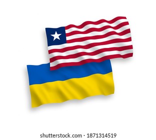 Banderas de olas de tela vectorial nacional de Liberia y Ucrania aisladas en fondo blanco. de 1 a 2.