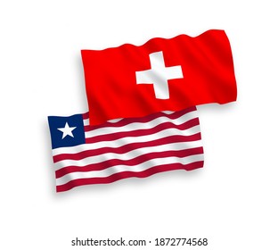 National vector fabric wave flags of Liberia and Switzerland isolated on white background. 1 to 2 proportion.