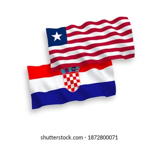 National vector fabric wave flags of Liberia and Croatia isolated on white background. 1 to 2 proportion.