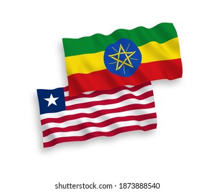 Nationale Vektor-Wellen-Flaggen von Liberia und Äthiopien einzeln auf weißem Hintergrund. 1 bis 2 %.
