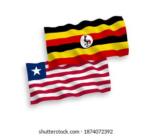 National vector fabric wave flags of Liberia and Uganda isolated on white background. 1 to 2 proportion.