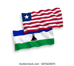 Nationale Vektor-Wellen-Flaggen von Liberia und Lesotho einzeln auf weißem Hintergrund. 1 bis 2 %.