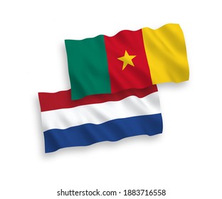 National vector fabric wave flags of Cameroon and Netherlands isolated on white background. 1 to 2 proportion.