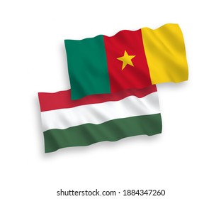 National vector fabric wave flags of Cameroon and Hungary isolated on white background. 1 to 2 proportion.