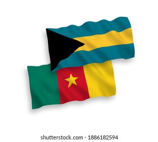 National vector fabric wave flags of Cameroon and Commonwealth of The Bahamas isolated on white background. 1 to 2 proportion.