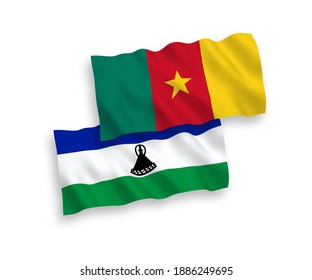 National vector fabric wave flags of Cameroon and Lesotho isolated on white background. 1 to 2 proportion.
