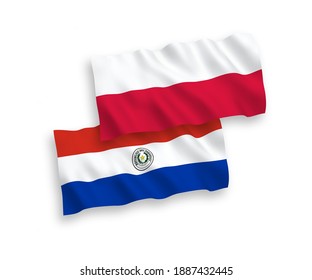 National vector fabric wave flags of Paraguay and Poland isolated on white background. 1 to 2 proportion.