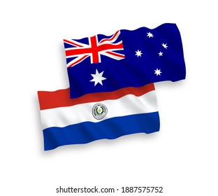 National vector fabric wave flags of Australia and Paraguay isolated on white background. 1 to 2 proportion.