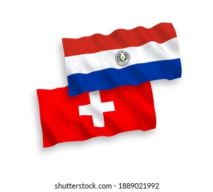 National vector fabric wave flags of Paraguay and Switzerland isolated on white background. 1 to 2 proportion.