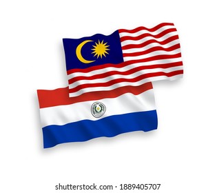 Nationale Vektorgrafik-Wellenflags von Paraguay und Malaysia einzeln auf weißem Hintergrund. 1 bis 2 %.