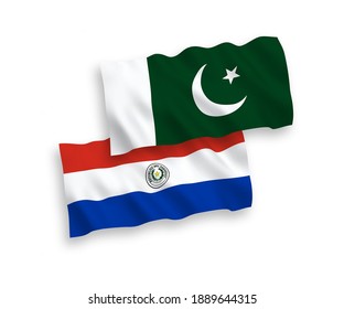 National vector fabric wave flags of Paraguay and Pakistan isolated on white background. 1 to 2 proportion.
