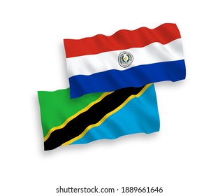 National vector fabric wave flags of Paraguay and Tanzania isolated on white background. 1 to 2 proportion.